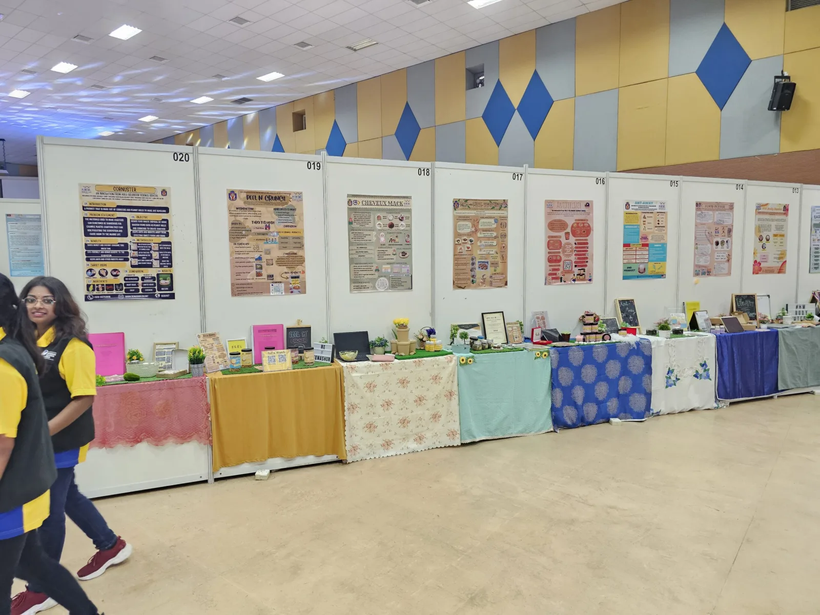 Visitors and exhibition stands at Pi-ENVEX 2024.