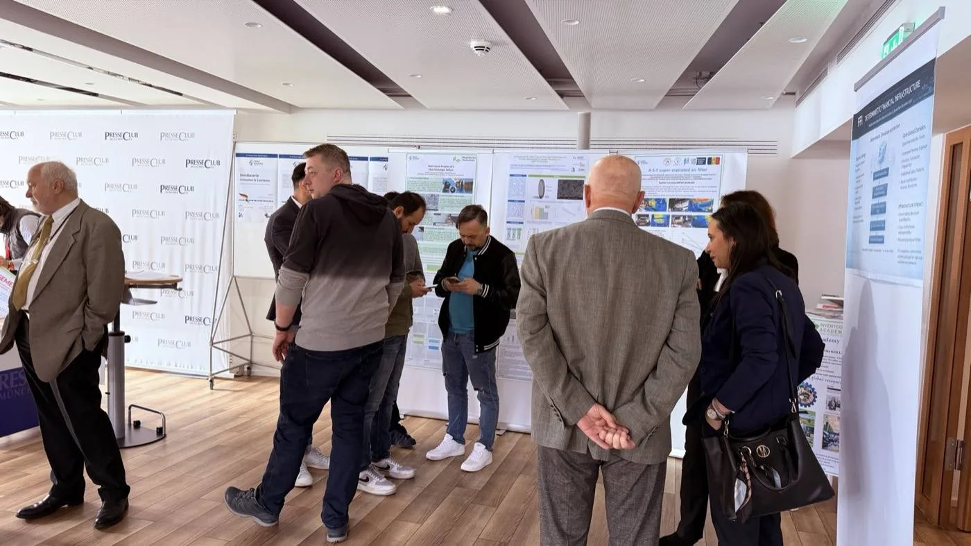 Visitors viewing invention posters at InnoBavaria 2026.