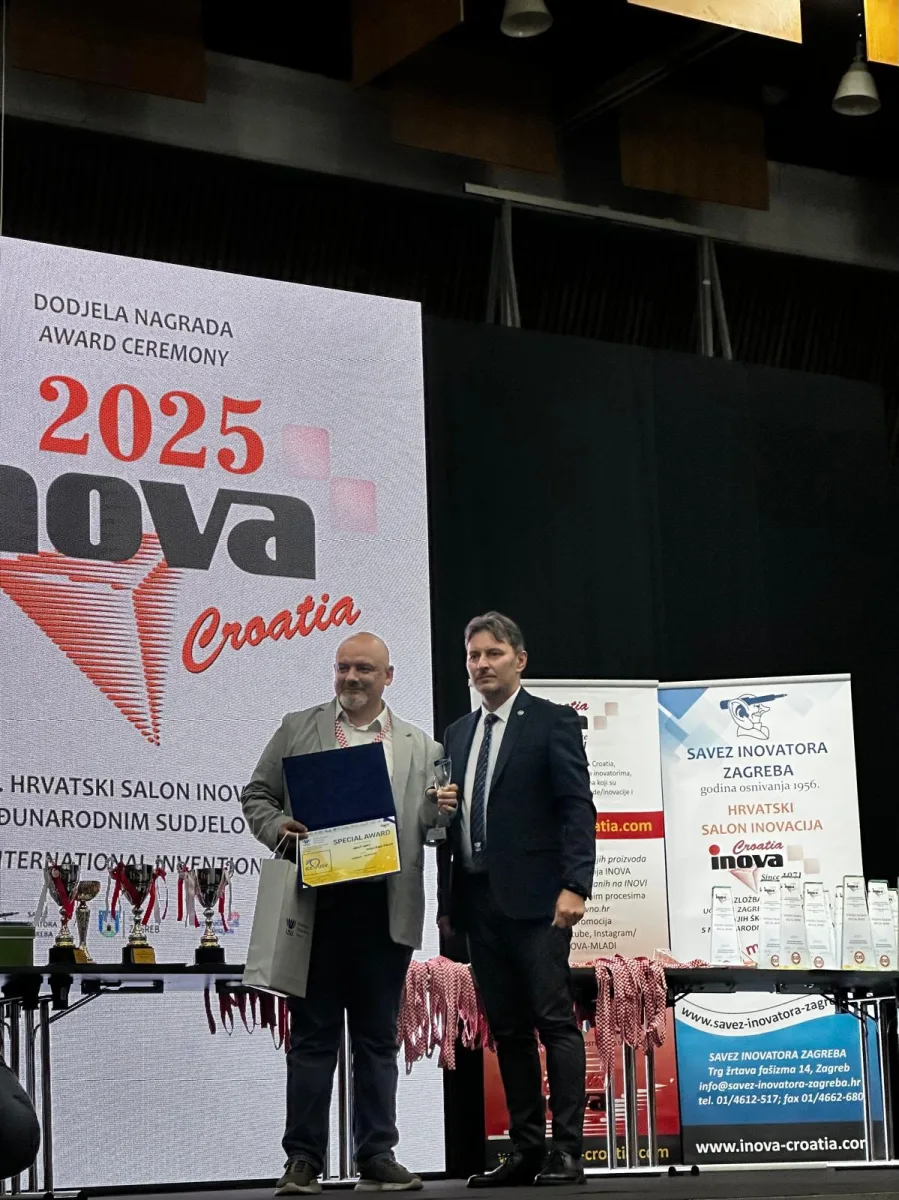 Award being presented on stage at INOVA 2025 in Zagreb.