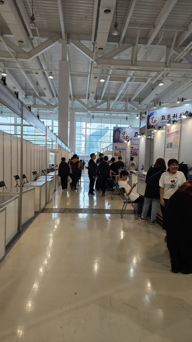 Visitors walking through the KIDE 2023 exhibition hall.