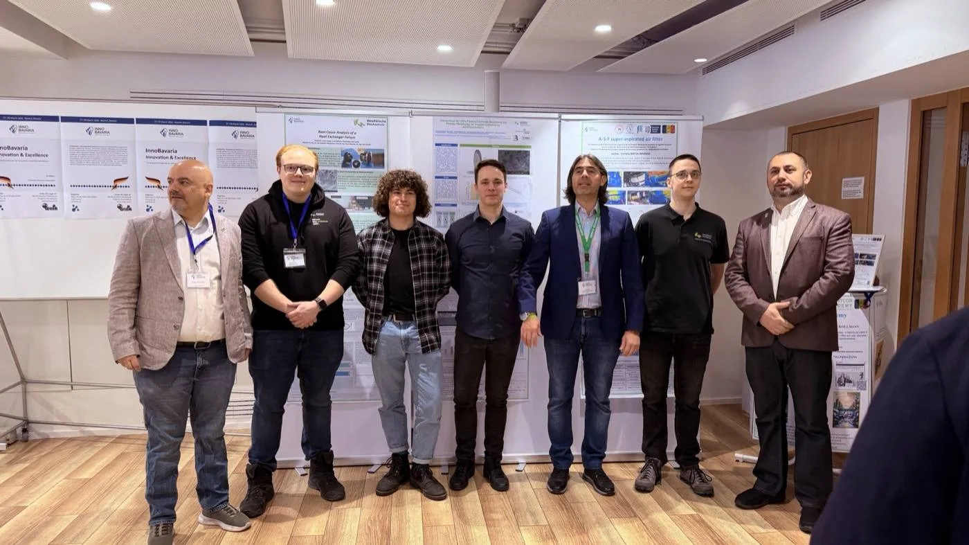A group of innovators standing in front of invention posters.